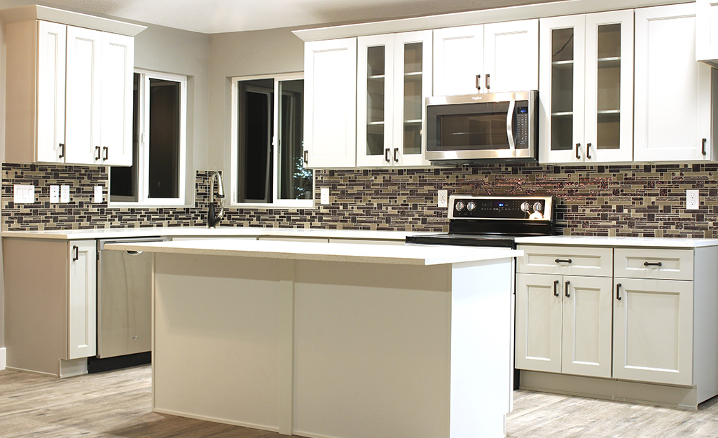 A kitchen installed with modular cabinets.