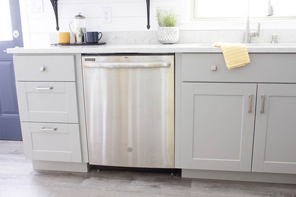 A GE stainless steel dishwasher.