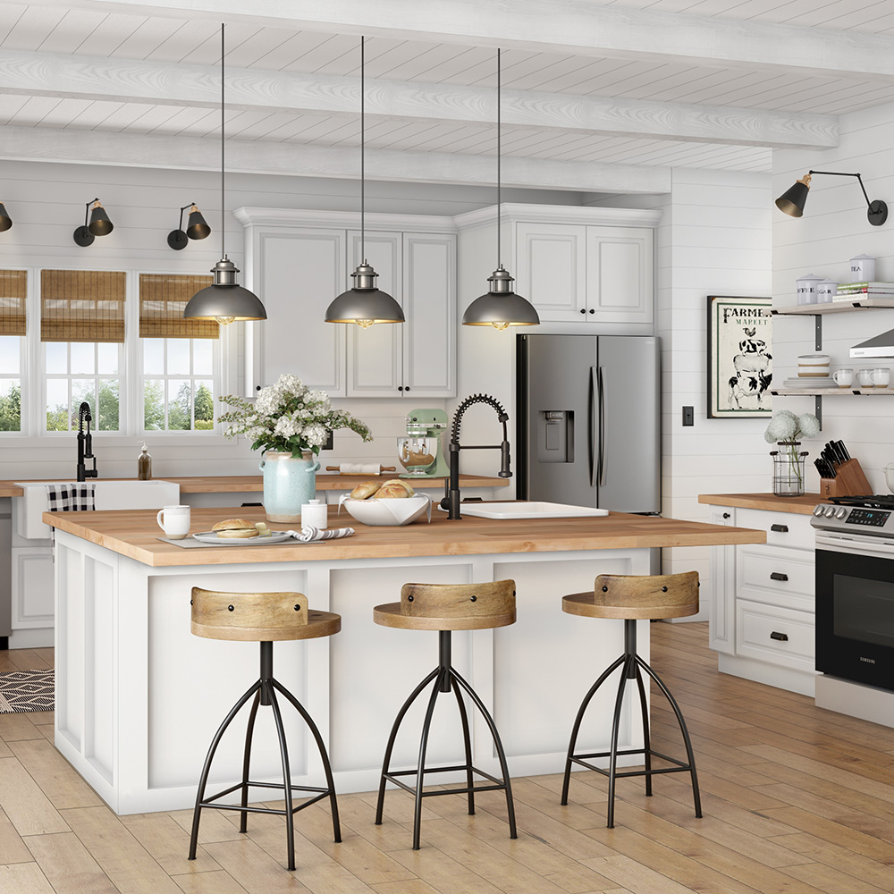 A remodeled kitchen featuring pendant lights and task lighting. A remodeled kitchen featuring pendant lights and task lighting.