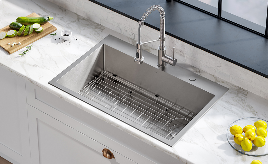 replacing a small kitchen sink with a large sink