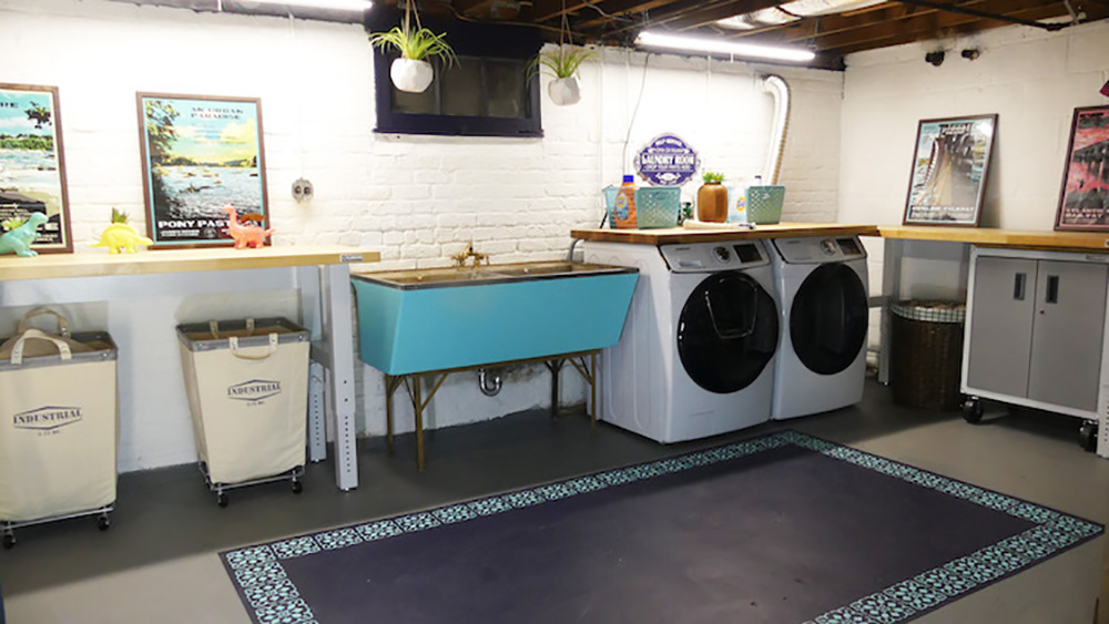 A basement turned laundry room with a painted floor.