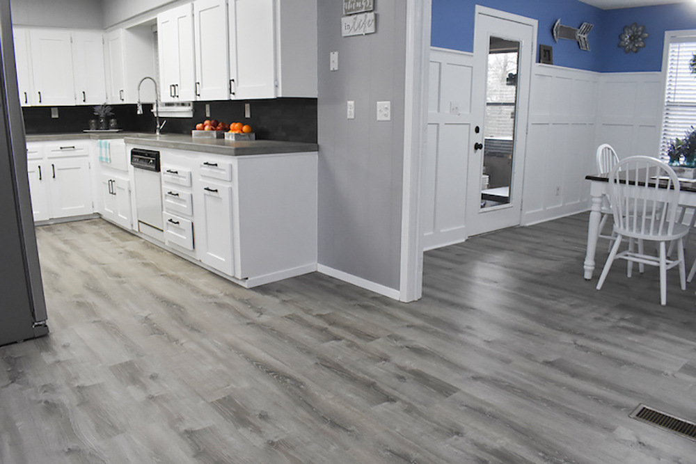 A kitchen and dining room with LifeProof flooring