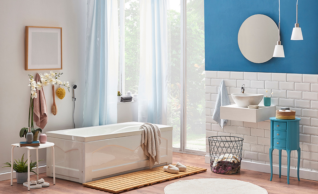 Colorful primary bath featuring a coastal style. Colorful primary bath featuring a coastal style.