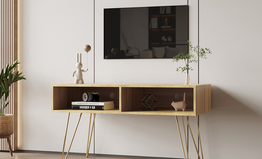 A console table used as a media cabinet.