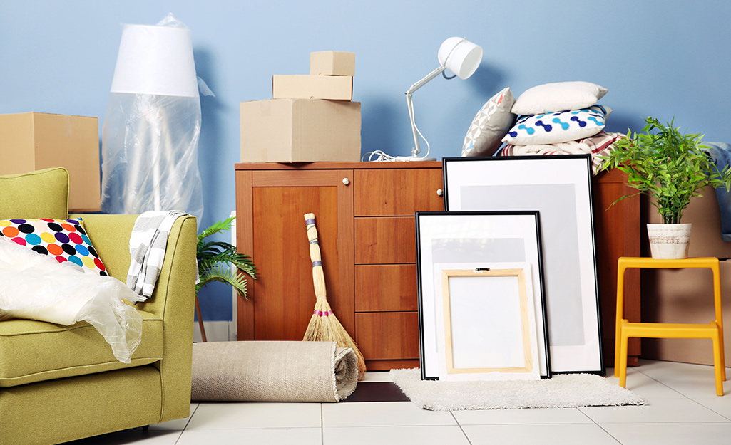 Boxes and furniture waiting to be packed.