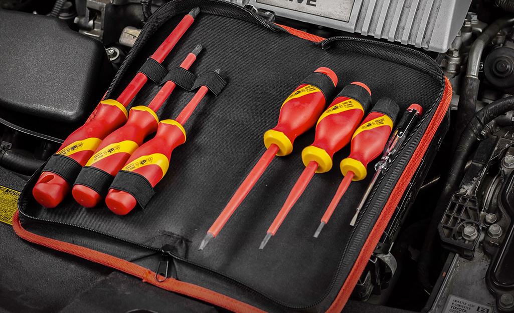 A complete professional screwdriver set stored in a tool case.