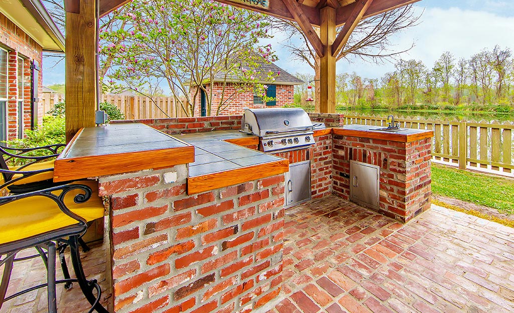 An outdoor brick kitchen.