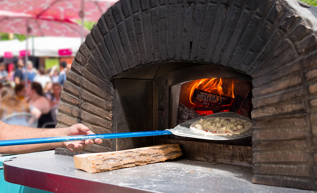An outdoor kitchen pizza oven.