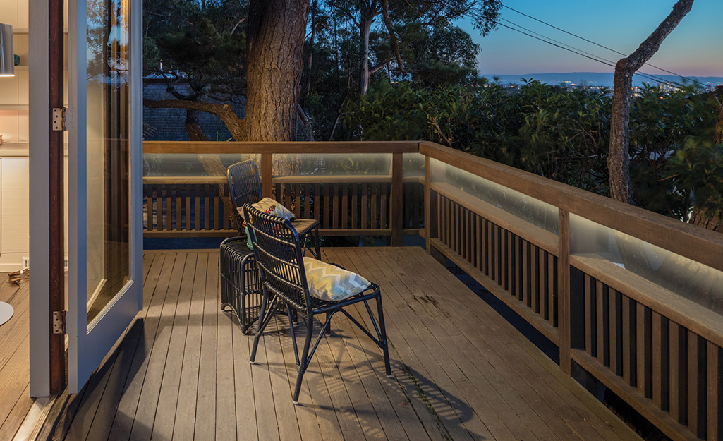 EcoSmart tape lighting installed along a deck railing