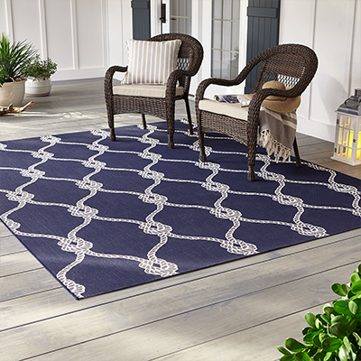 Outdoor Rug Care, How To Keep Outdoor Rugs In Place On Concrete Floor