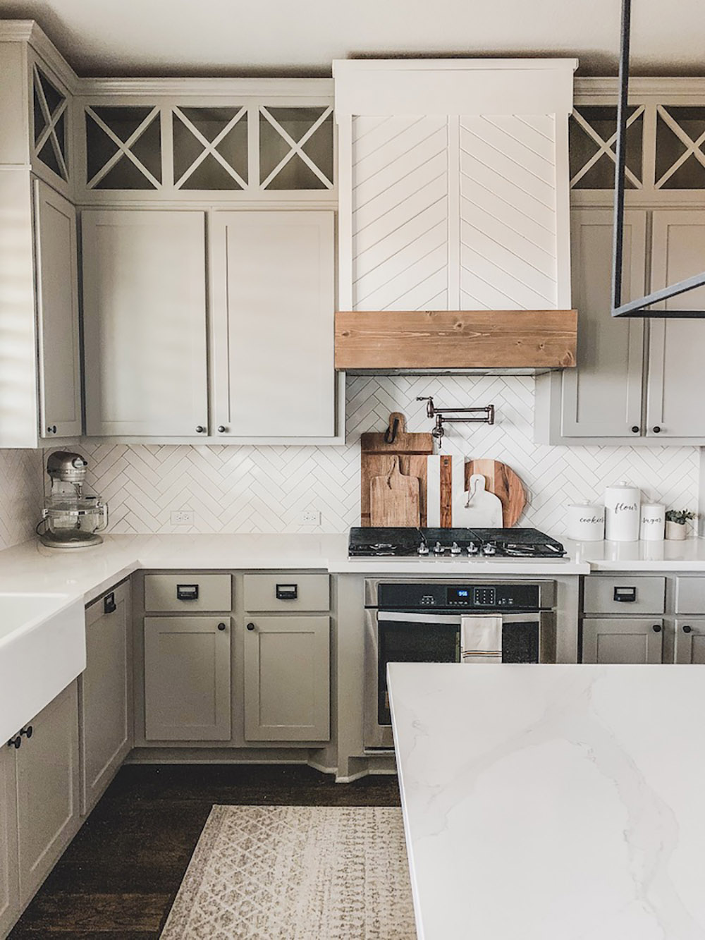 A modern farmhouse kitchen with new Calacatta Gold Silestone quartz countertops.