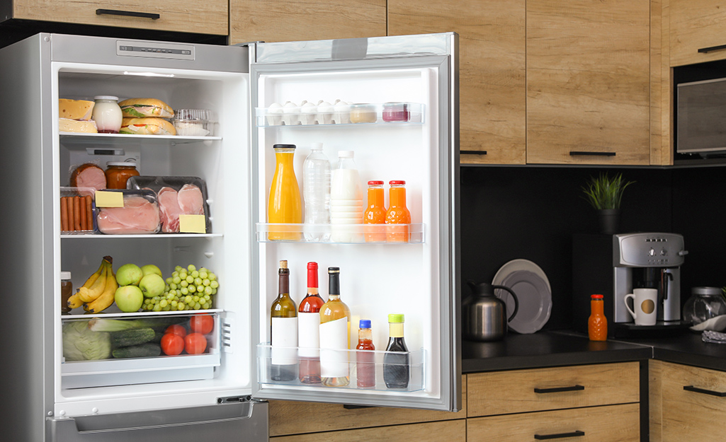 A refrigerator section containing wines and drinks.