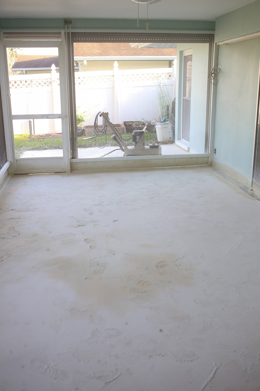 A smoothed concrete patio floor. A smoothed concrete patio floor.