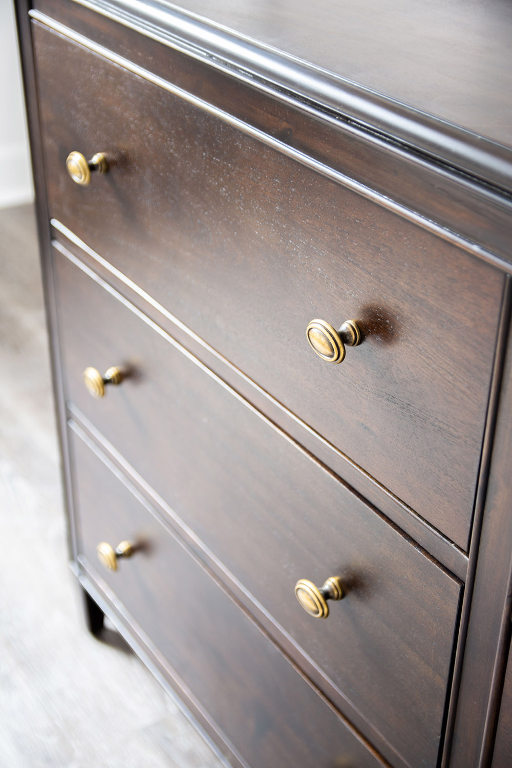 Wooden dresser with gold handles. Wooden dresser with gold handles.