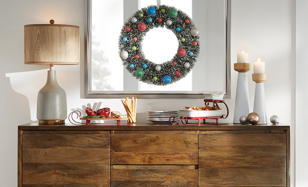 Buffet topped with holiday decor and food. Buffet topped with holiday decor and food.