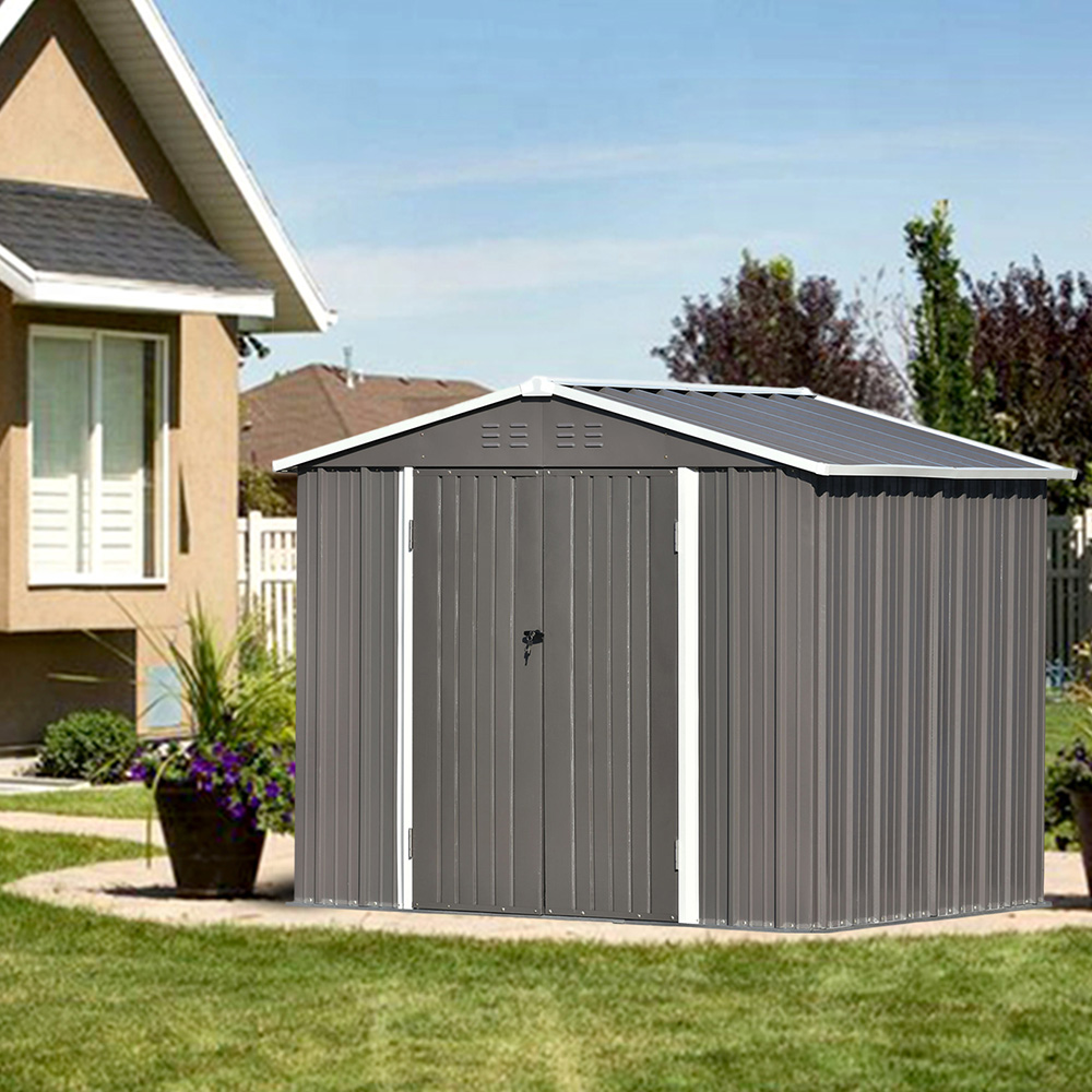 A storage shed in the yard of a home.