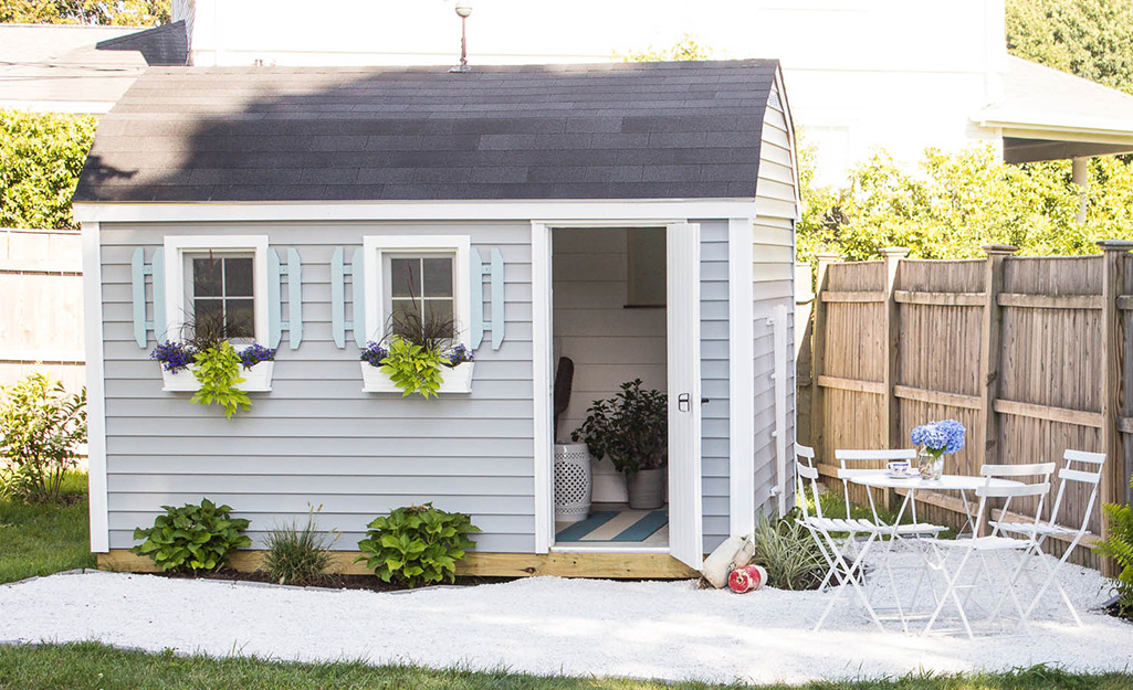Shed with a patio and furniture Shed with a patio and furniture