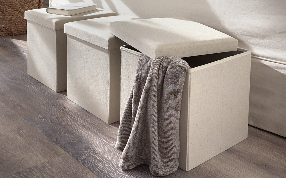 Beige ottomans with removable tops.