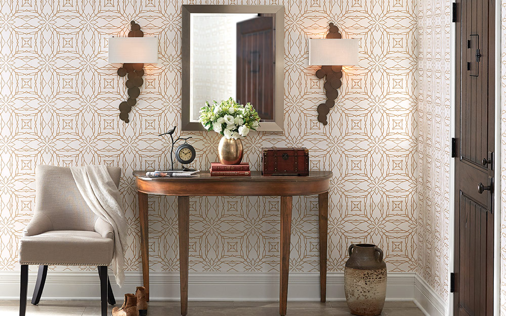 A well-accessorized entryway with table and chair. 