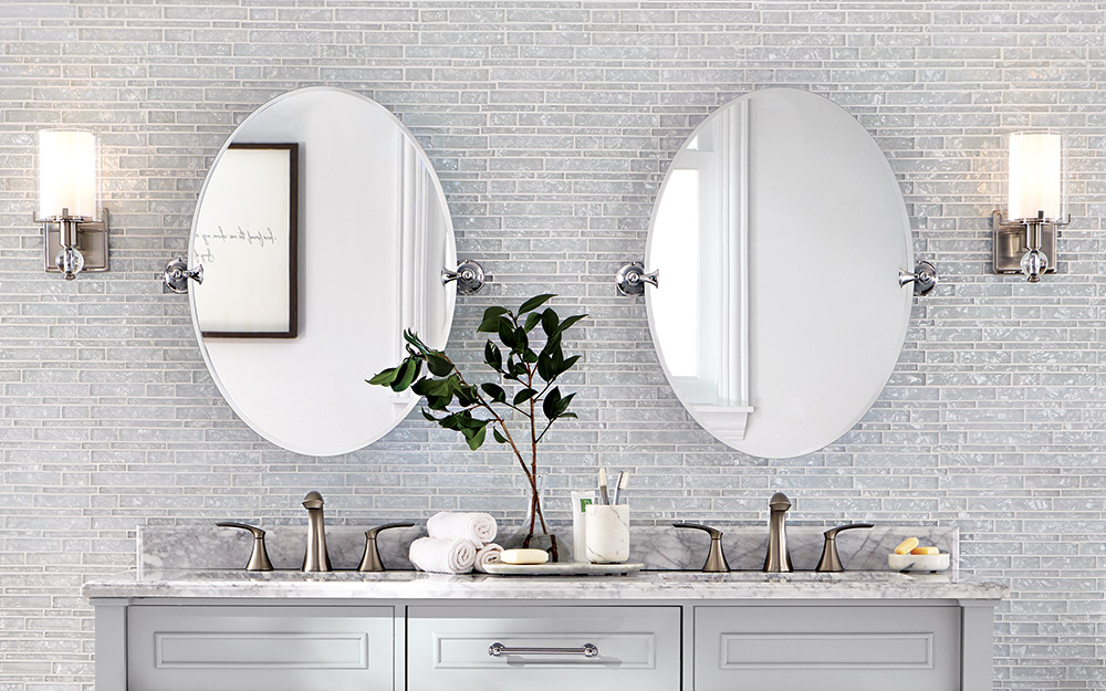 Double mirrors hanging over a double vanity.