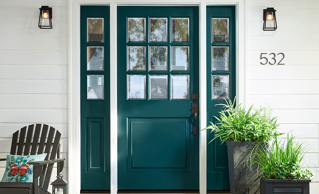 An emerald green painted front door. An emerald green painted front door.