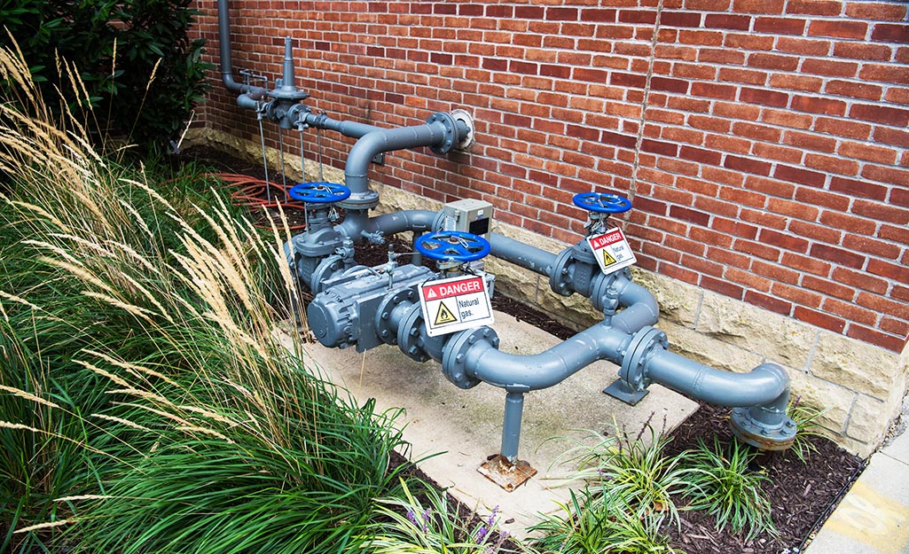 Natural gas line outside of a home. Natural gas line outside of a home.