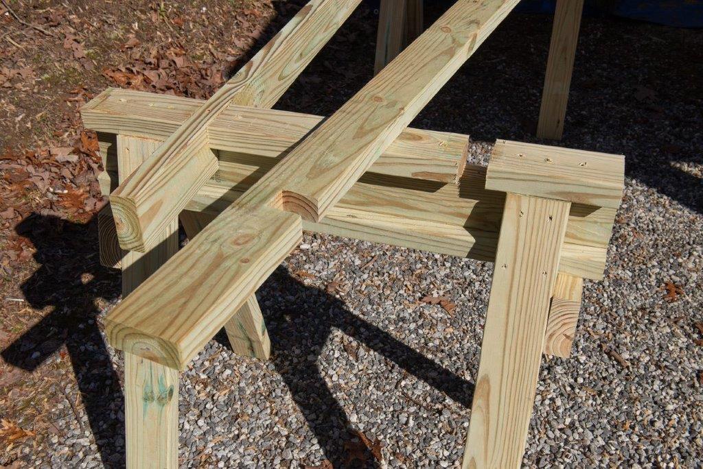A finished sawhorse with notches for attaching a tabletop. A finished sawhorse with notches for attaching a tabletop.