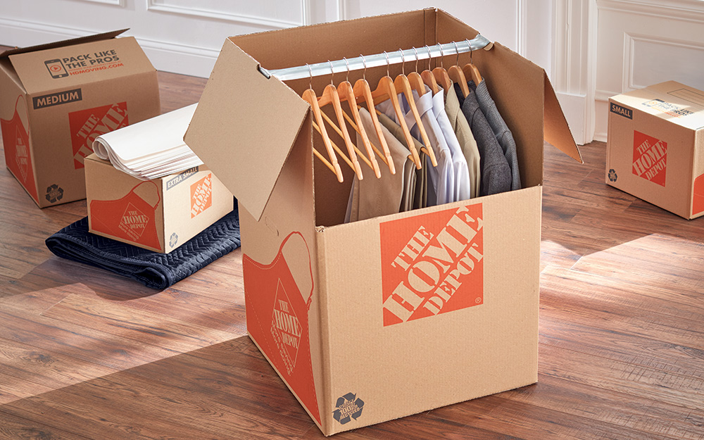 A variety of moving boxes sitting in an empty room.