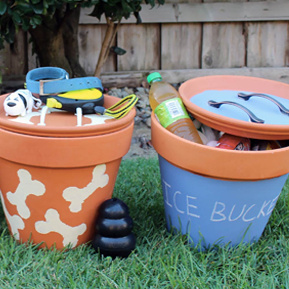 Terra cotta storage containers in a yard.