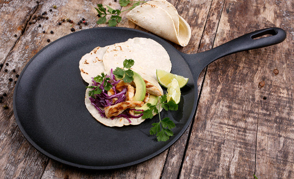 A specialty crepe pan with tacos on it.