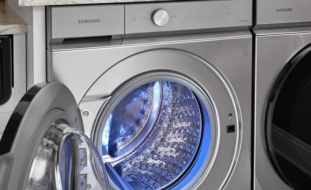 A washing machine featuring inside lighting.