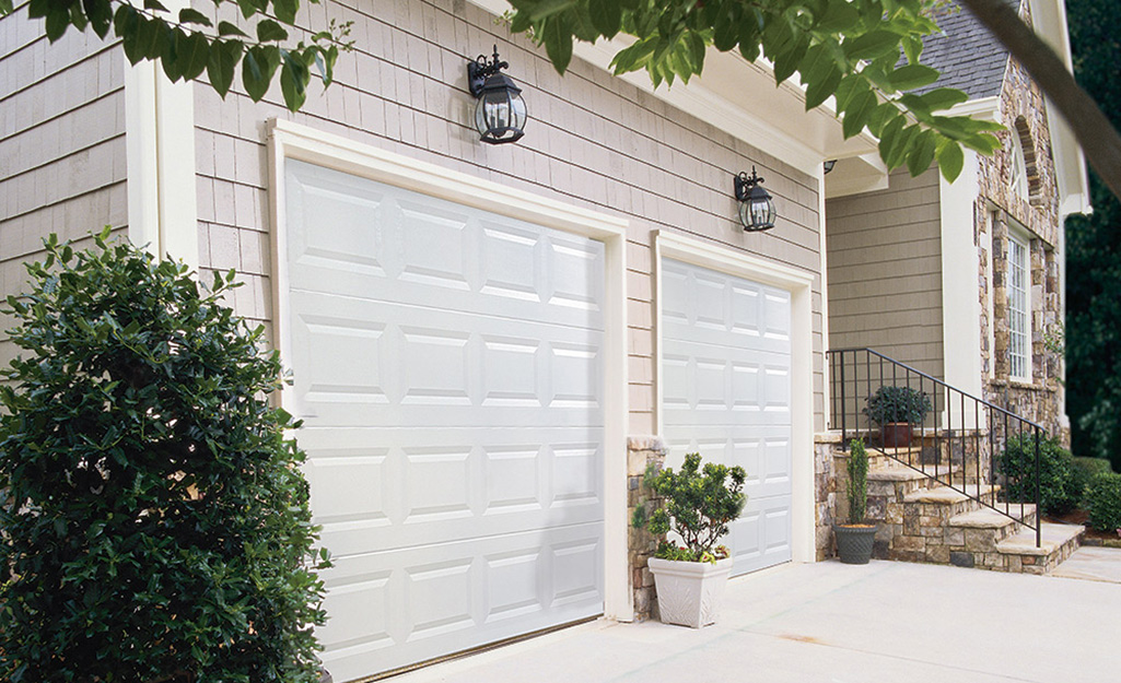Two exterior lights on a double car garage. 