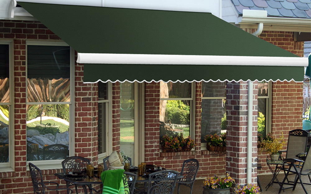 A retractable awning on the side of a brick building