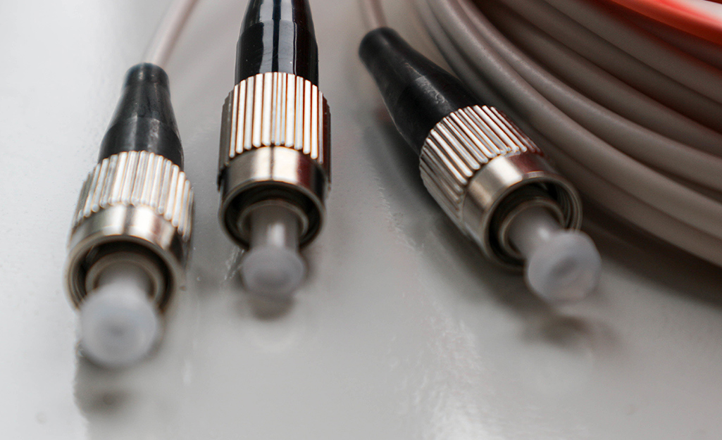 Three fiber optic cables with connectors.