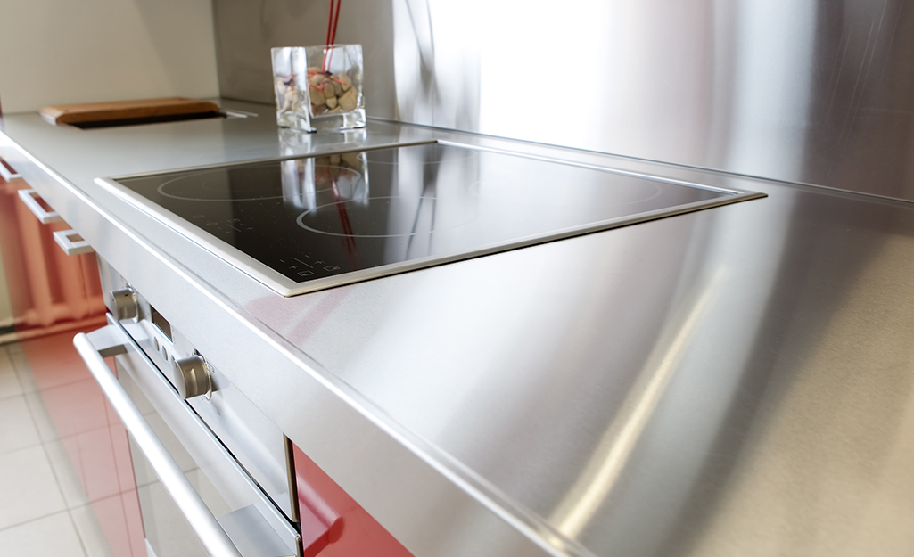 A stainless steel countertop in a kitchen.