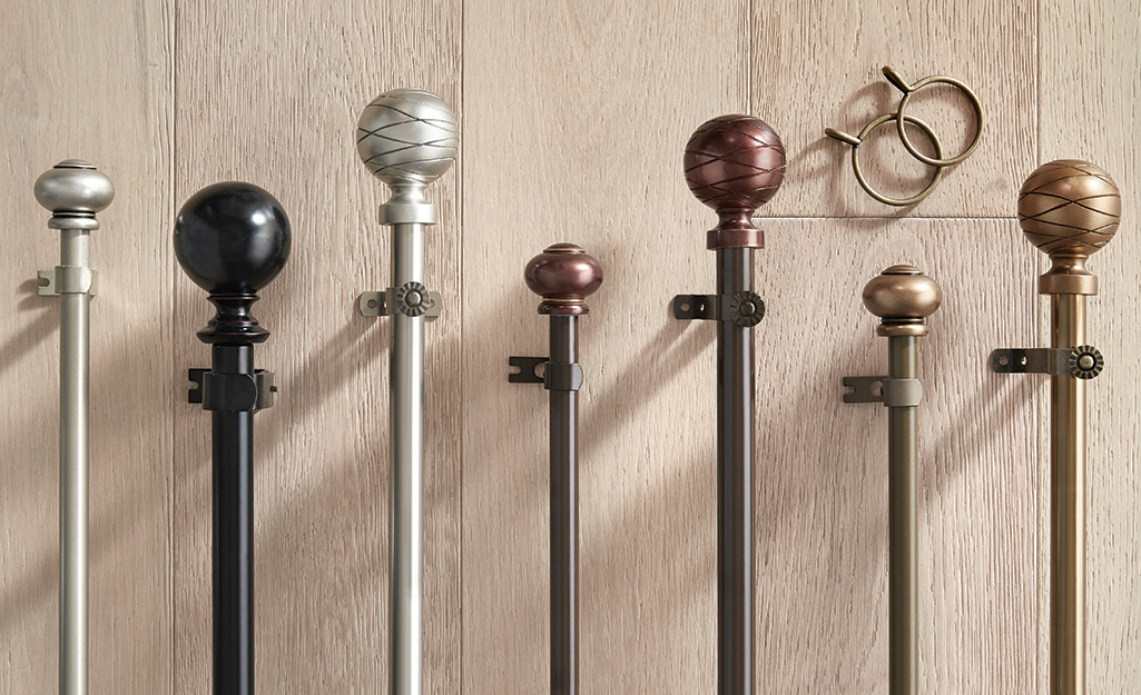 Several types of curtain rods featuring different finishes/