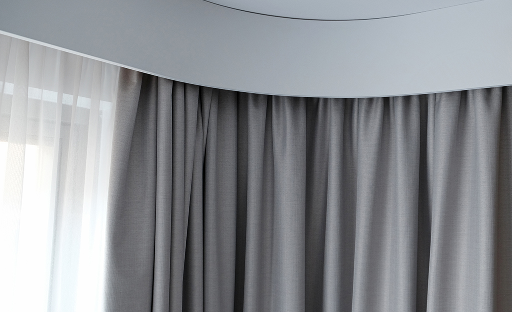 Curtain rods and drapery hardware