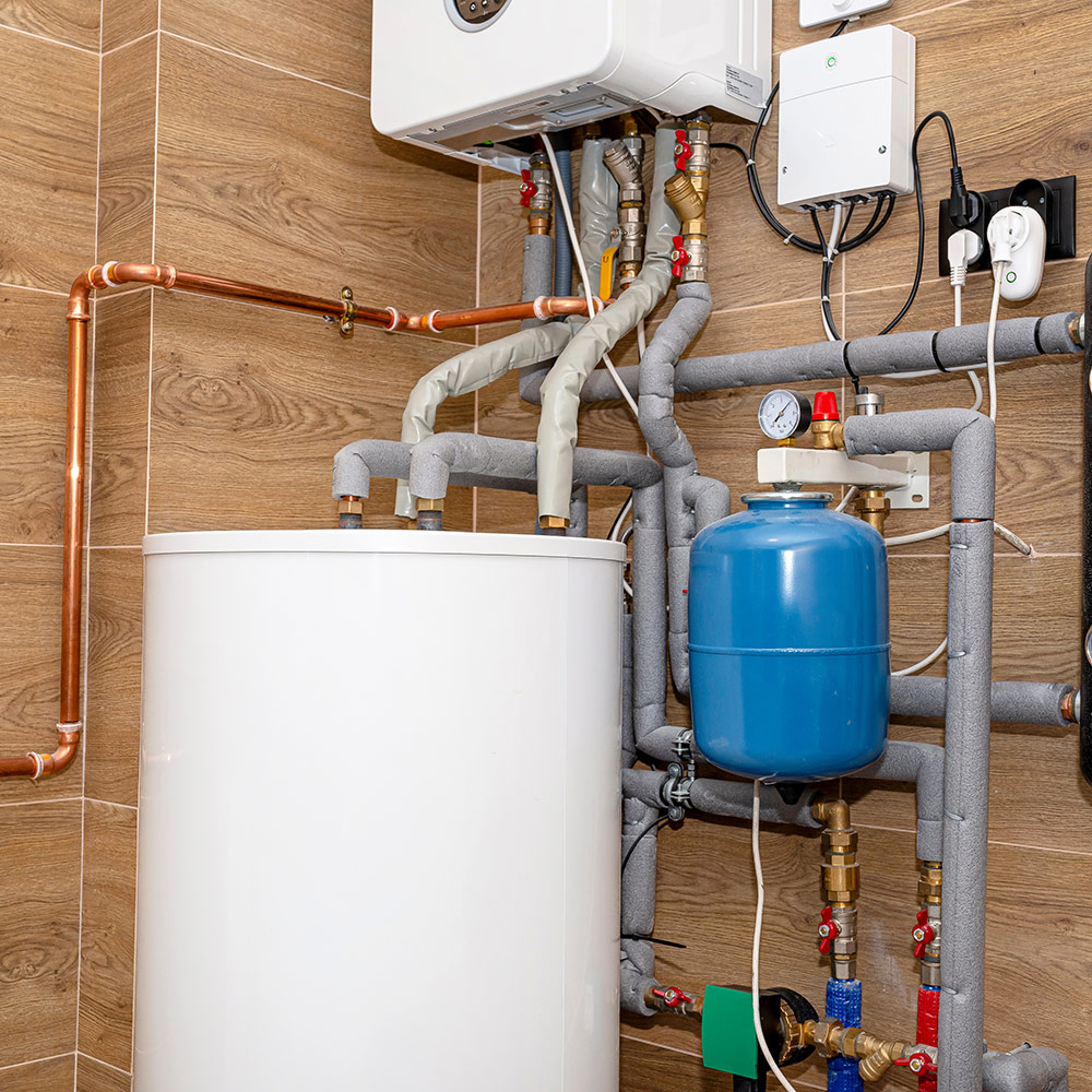 A hot water heater and pipes.