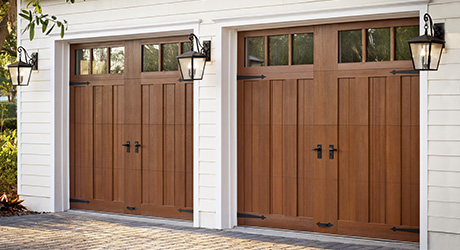 The front of a house showing a traditional garage door