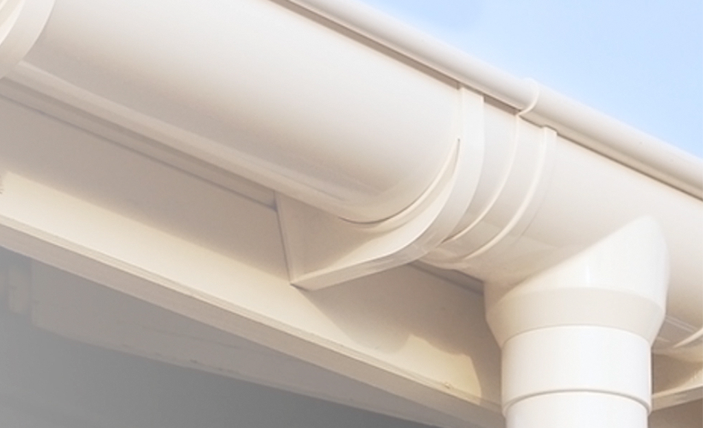 A half-round gutter system installed on a home.