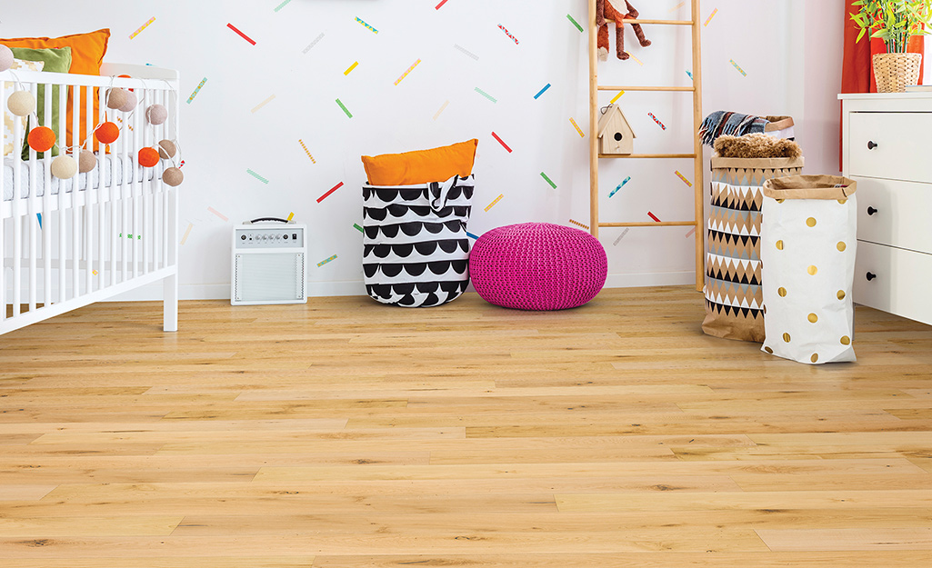 A children's room with engineered hardwood flooring.