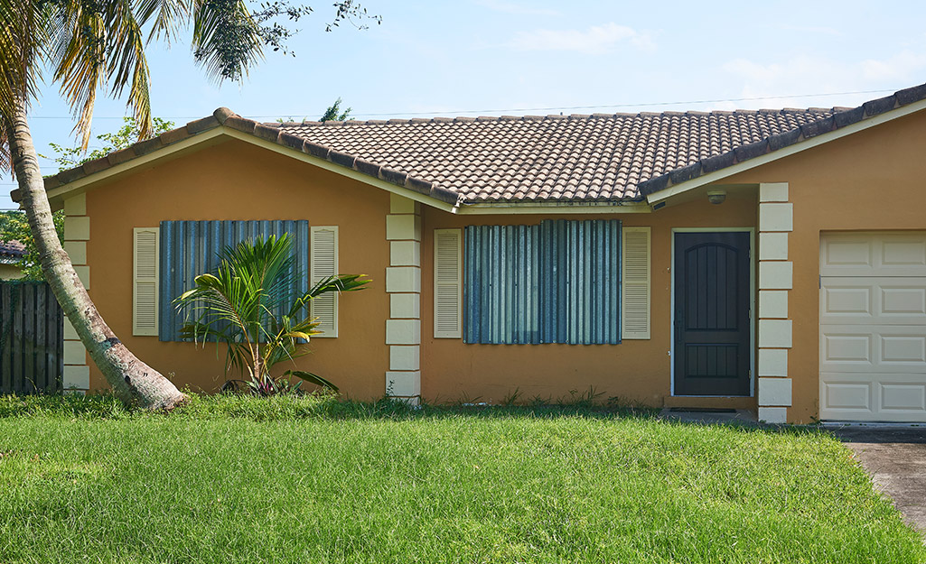 A home with accordion shutters. 