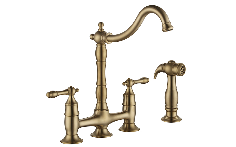 A two-handle faucet in a gold finish. 