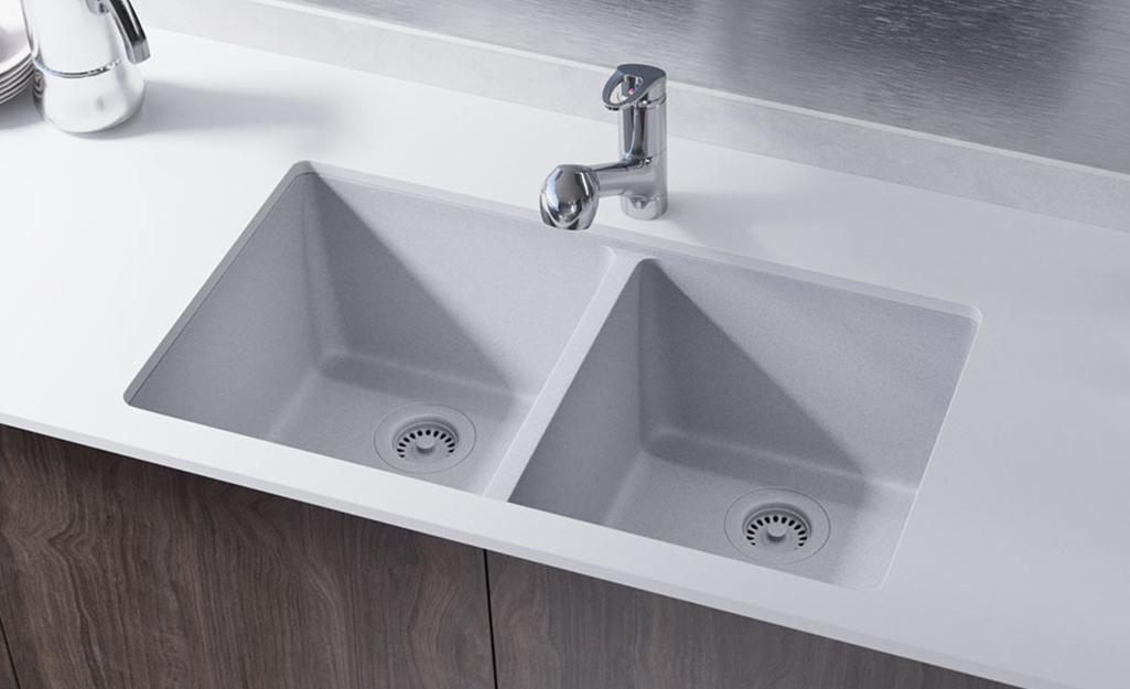 A quartz granite composite double sink.