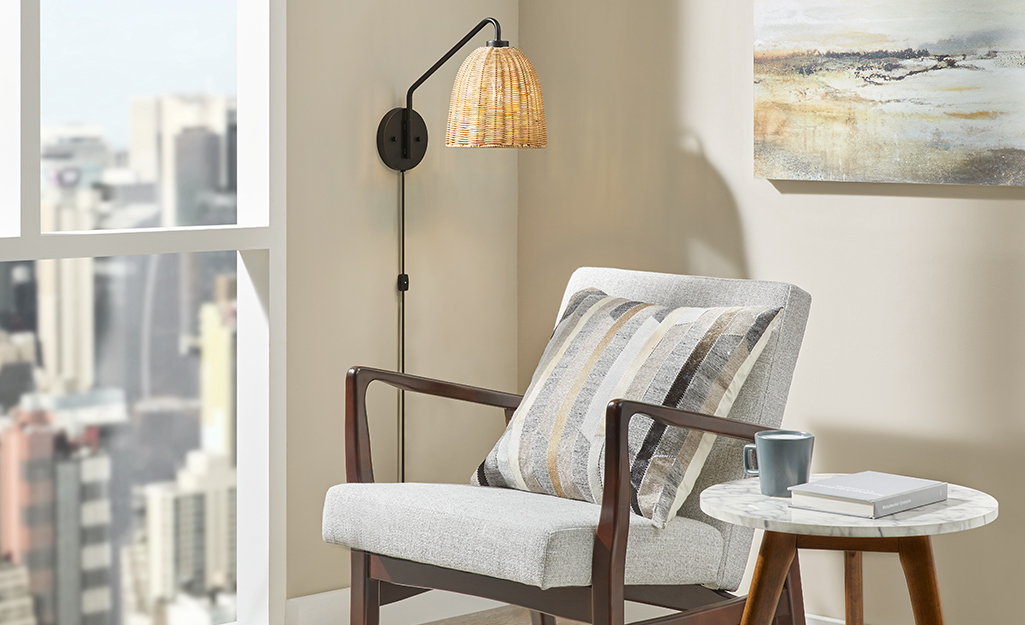 A floor lamp featuring a fluted paper shade.