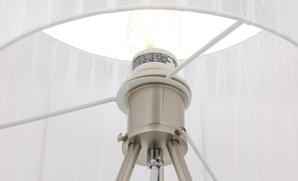 A lamp shade with a screw on fitter.