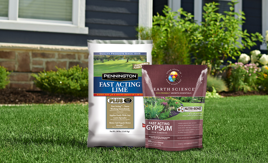 Bags of lime and gypsum in a lawn