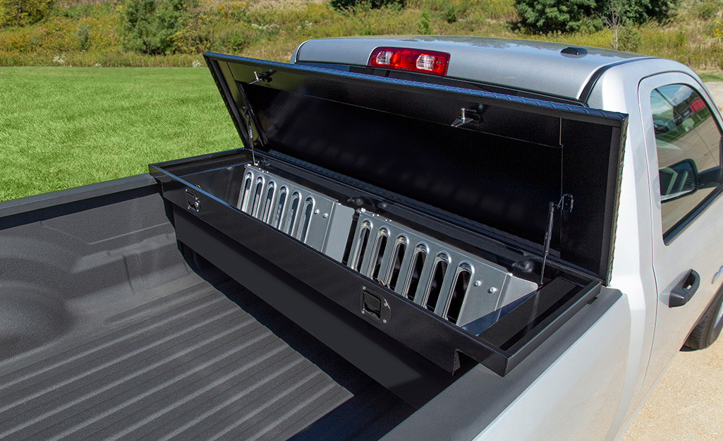 A lightweight loading ramp folds into sections and fits into a truck toolbox.