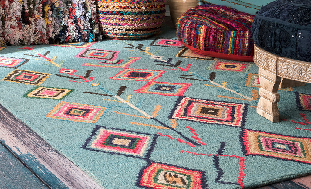 A southwestern rug in a living room.