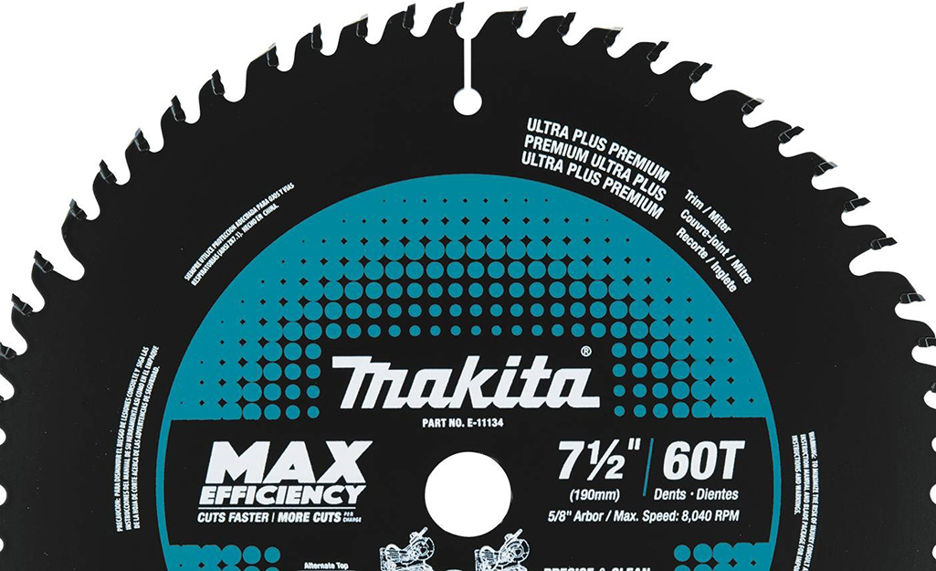 Close up of a rotary saw blade's cutting teeth.